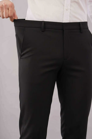 2 flexiwaist formal black pants being held up by person