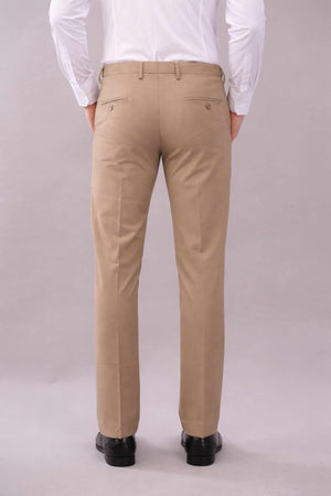 Person wearing flexi waist beige pants and a white shirt